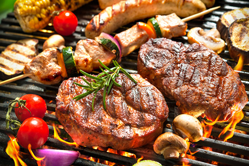 steak and barbecue on the grill